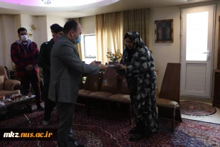 دیدار ریاست دانشگاه فنی و حرفه ای استان مرکزی با خانواده شهید معبود نیا  4